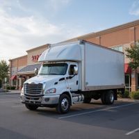 White delivery truck parked